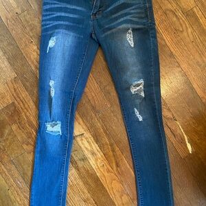 Distressed Blue Jeans